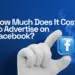Guide on how much it costs to advertise on Facebook, featuring a hand holding a Facebook icon with currency symbols.