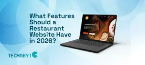 What features should a restaurant website have in 2026 – modern laptop displaying restaurant homepage with Techabyte branding
